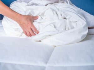 Removing dirty bed sheets