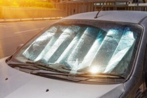 Car in sun with windshield screen