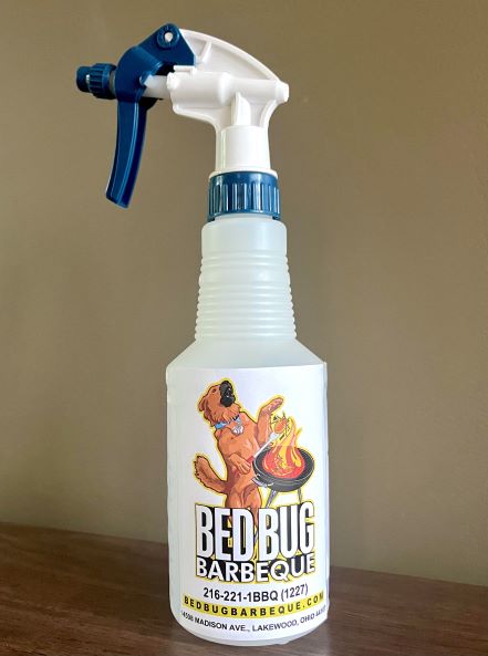 Spray bottle with Bed Bug Barbeque logo
